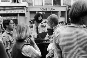 Annual Prints: Notting Hill Carnival. The police check point for people who have had wallets, bags etc