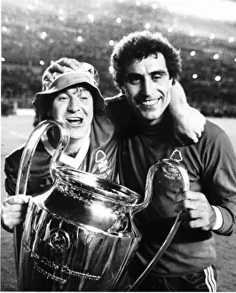 Nottingham Forest players John Robertson and Peter Shilton celebrate with the trophy