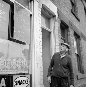 Notts Forest fan and cafe owner with his unwanted FA cup semi final tickets for sale