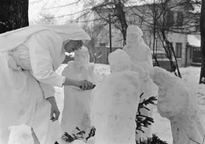 Nun at a Basildon convent creates a nativity scene from snowmen. December 1963