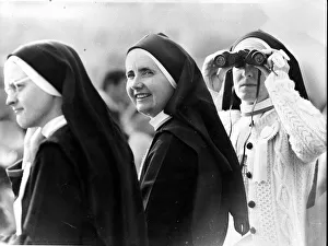 Binoculars Prints: Nuns - Nuns. one with binoculars, wait to see the Pope John Paul at Pontcanna fields