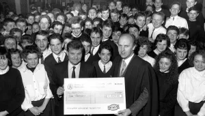 Money Prints: Nunthorpe Comprehensives head teacher John Rowling is presented with a £10