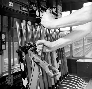 Occupation: Signalman: Peter Sage railway signalman seen here working in his signal box