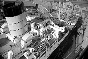 The ocean liner Queen Mary berthed at Clydebank docks circa 1938