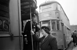 Vauxhall Prints: Office Cleaner Mrs Packham seen here on the tram from Vauxhall to Central London