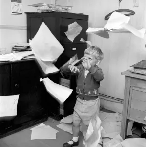 Filing Cabinet Prints: Office Junior: Two year old boy helps out at the offices of Theobald and son. 1957