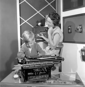 Office Junior: Two year old boy helps out at the offices of Theobald and son