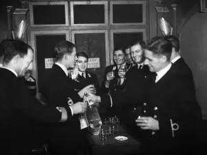 01479 Prints: Officers of HMS Ajax and Exeter enjoying a drink during the interval at the London