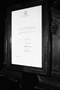 The official announcement of the birth of Prince William pinned to the gates of