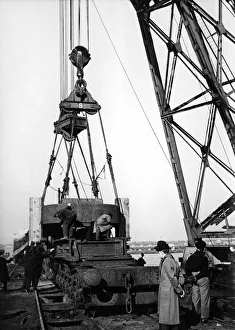 Welsh Prints: Offloading one of the giant roll housings shipped from American in the SS Wells City for
