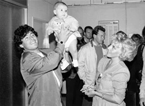 00253 Collection: Oh Baby. Diego Maradona and girlfriend, Caludia show off daughter Dalma
