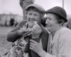 Blackpool Prints: The old folks go young for a day. Gertie Food and Florrie White share a plate of whelks