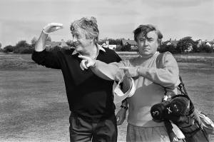 01127 Prints: Old friends Michael Parkinson and Jimmy Tarbuck on the fairway at The Royal Liverpool