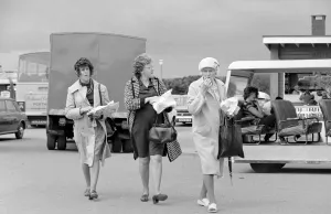 00124 Prints: Old ladies enjoying fish and chips during a day out to the beach at Trecco Bay