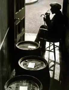 Relaxation Prints: An old man enjoying a drink in his local tavern at Dartmouth Devon November 1939