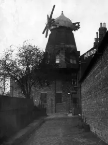1929 Prints: This old mill, formerly known as the Chimney Mills, is now the club house of Newcastle