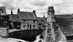 The Old Mill Pond Swanage, Dorset. Note the old chimney built on to the cottage in
