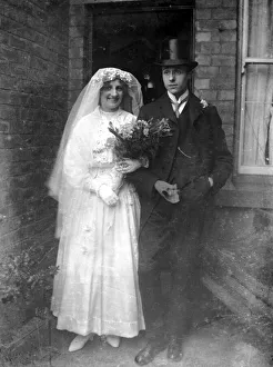 Bouquet Prints: An old time wedding circa 1925 A bride and groom pose outside their North East home