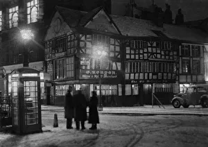 An old world effect in the shambles in the older part of Manchester was enhanced by snow
