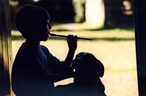 Oliver Jackson, 11, from Hexham plays the penny whistle in June 1998