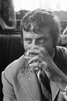 Drink Prints: Oliver Reed, British actor, enjoys a few drinks at his local pub, The Dog and Fox