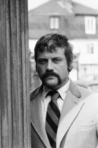 01209 Prints: Oliver Reed, British actor, enjoys a few drinks at his local pub, The Dog and Fox