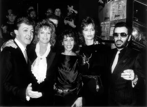 Core08 Prints: Olivia Harrison, wife of George, with former Beatle Paul McCartney and wife Linda