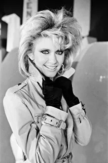 01060 Collection: Olivia Newton John, singer and actor, pictured during a video shoot at Pinewood Studios