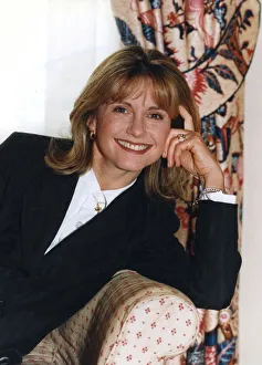 01478 Prints: Olivia Newton-John smiling during interview in London hotel - January 1995