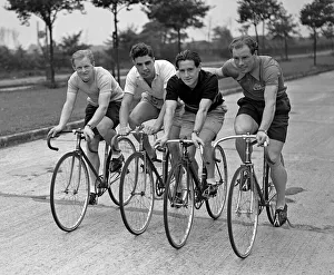 Olympic cyclist and World Sprint Champion Reg Harris (right