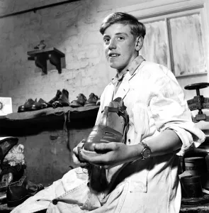 Apprentices Prints: Orphan boy training to be a cobbler. December 1953 D7472A-001