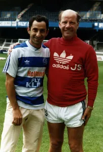 Hugging Prints: Ossie Ardiles Former manager of Tottenham Hotspurs FC with Jim Smith Manager of Derby