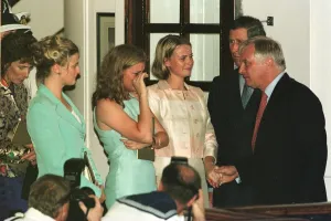Outgoing governor of Hong Kong Chris Patten comforts memebers of his family Alice