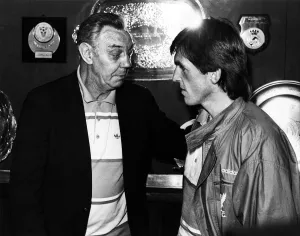 00246 Prints: Outgoing Liverpool manager Joe Fagan welcomes his successor Kenny Dalglish May 1985