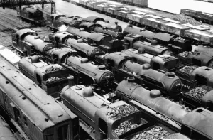 Outside Kings Cross engine sheds locomotives stand idle on 1st June 1955 - a sight