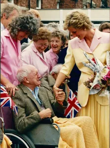 Royal Visit Prints: Overcome with emotion, Mr Rossiter Miller receives a comforting hand from Princess Diana