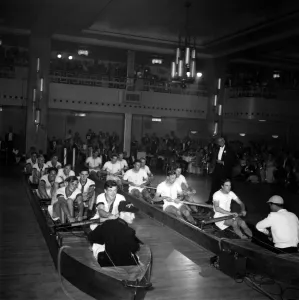00014 Prints: The Oxford and Cambridge boat race crews re enact the race at the Lords Tavener Ball