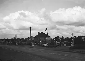 Signs Prints: The Oxford Road at Denham, Tatling End petrol filling station crowded with unsightly