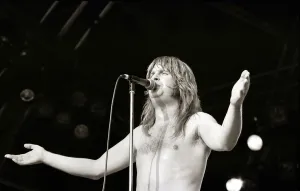 Topless Prints: Ozzy Osbourne performing on stage during a concert 3rd August 1981