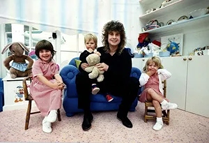Rockers Prints: Ozzy Osbourne rock singer from the rock group Black Sabbath with his family May