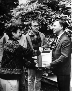 Demonstration Prints: Pacifist campaigner Pat Arrowsmith ahands a biscuit tin full of collection money to Czech