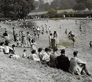 The paddling pool in Cannon Hill Park - packed with toddlers while thte Mother