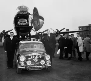 Rally Prints: Paddy Hopkirk (l) and Henry Liddon arrive back in the UK after winning the 1964 Monte