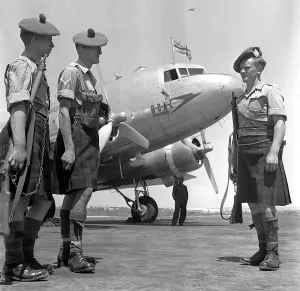 Aeroplanes Prints: Palestine British Army 1947 Soldiers guard a BOAC DC3 from Jewish terrorists in