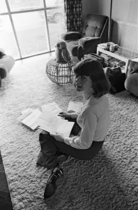 00702 Prints: Pam Ayres replies to fan mail in her lounge at her home in a village in Oxfordshire
