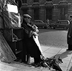 00617 Prints: Paper seller John Townsend has been selling papers outside St Martin-in-the-Fields for a