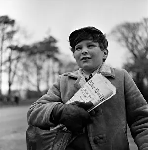 Paperboy Alan Preston delivering the Daily Telegraph in Lytham St Annes, Lancashire