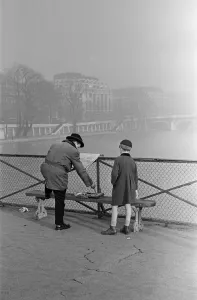 Artist Prints: Paris street scenes - Young boy watching an artist paint, 1951