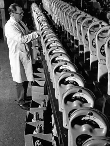 Parking Meter Prints: Parking Meters being checked using a stopwatch in the factory prior to dispatch all