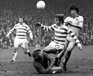 Images Dated 1st March 1975: Partick Thistles keeper Alan Rough makes a save at the feet of Kenny Dalgish